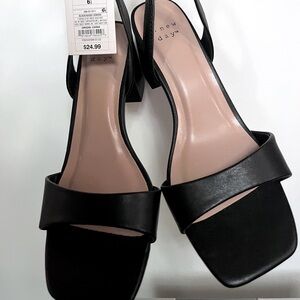 A New Day black heels, brand new with tags.